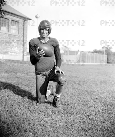 Slinging Sammy' Baugh, new addition to the Washington Redskins, poses for reporters circa September 1937.