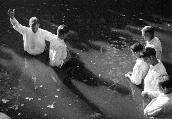 Baptism near Mineola, Texas circa Summer 1935.