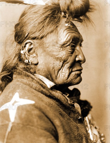 Edward S. Curtis Native American Indians - Hoop On the Forehead, Crow Indian circa 1908.