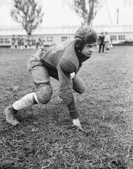 Otis Cole plays guard on the Navy team. 10/24/35.