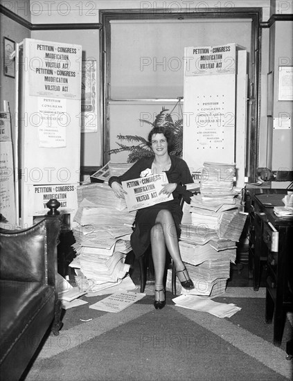 Woman with signs: Petition to Congress Modification, Volstead Act circa 1932.