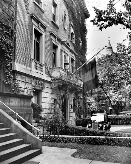 Flag at half staff, half mast, at Belgian embassy in Washington D.C. circa 1935 .