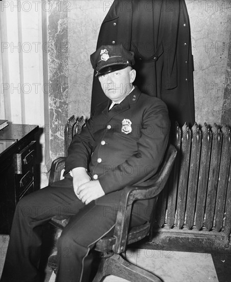 Fred. C. Parker, alleged life threatener of Sen. Huey Long, as he appeared at his post of duty in the House office building where he works as a member of the Capitol police force circa February 8, 1935.