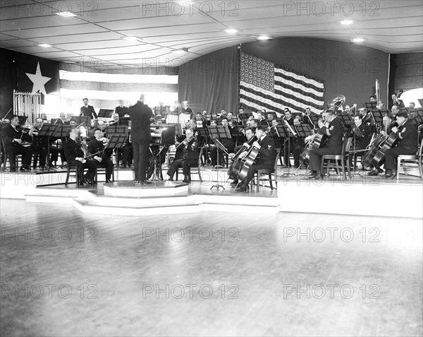 This photograph shows a portion of the U.S. Navy Band's 95-piece symphony orchestra for the first time - photo taken 11/25/1935.