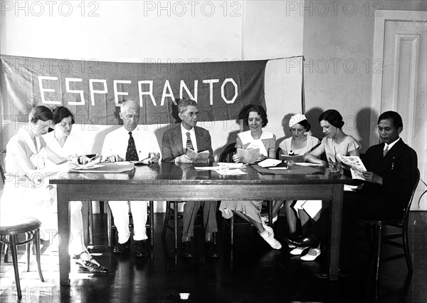 A group of people reading or studying Esperanto language circa 1934.