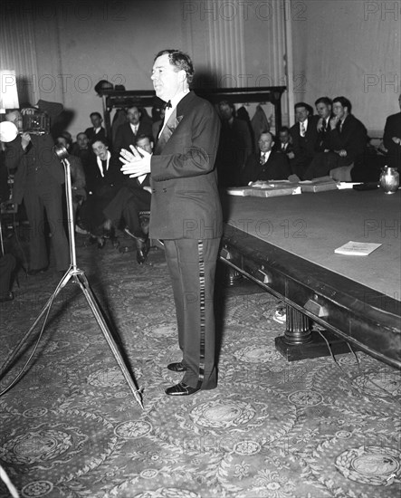 Senator Huey P. Long speaking in early 1935 .