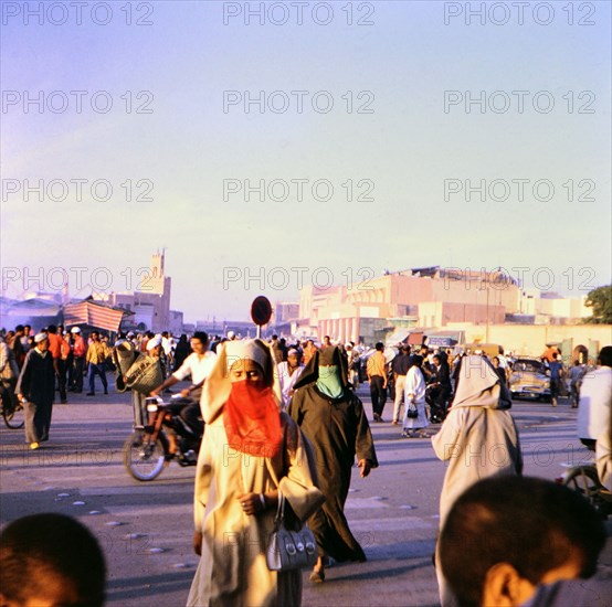 Veiled women on the streets of Rabat Morocco circa 1969.