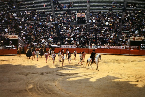 Parade of the bull fighters at the beginning of a bull fight in Mexico circa 1950-1955.