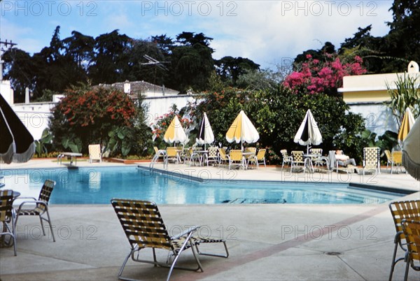 1962 Guatemala - Swimming pool and patio furniture at a luxury hotel in Guatemala, possibly the Biltmore circa 1962.