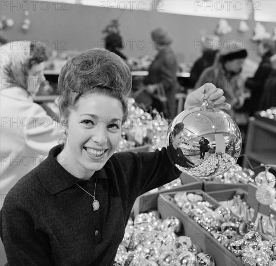 Christmas decorations for sale in department stores. Christmas decorations Date December 19, 1963.