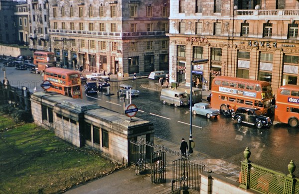 1961 London - Doubledecker Busses on Picadilly and Stratton Streets (Green Park Tube Station)  .