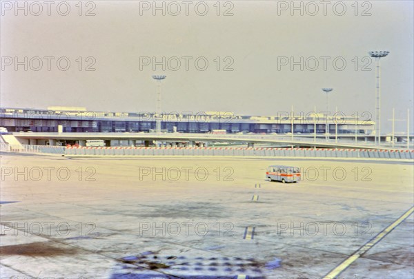 1972 France - (R) - A van driving across the tarmac at Orly Airport in Paris.