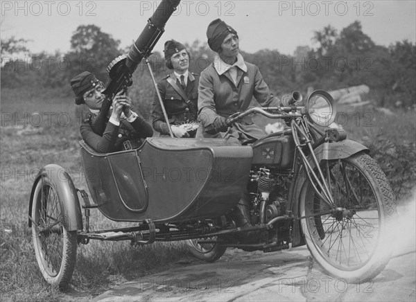 Policewomen With Machine Gun