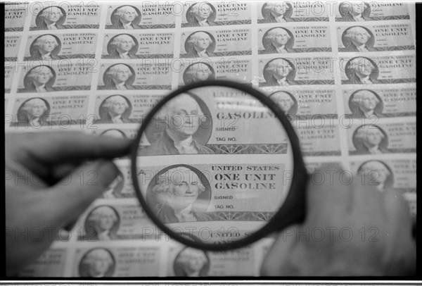 Gasoline Rationing Stamps Being Inspected, 1974