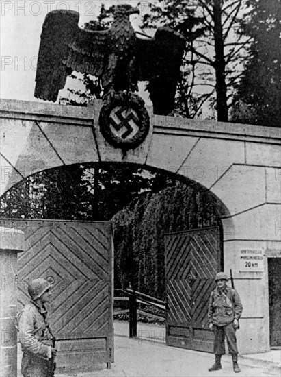 US Army Soldiers stand guard at the Dachau Concentration Camp