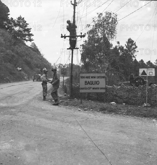 A sign with “You are now entering Baguio