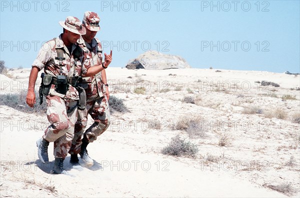 DESERT SHIELD - Colin Powell in fatigues in Saudi Arabia.