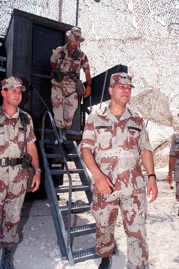 DESERT SHIELD - Colin Powell in fatigues in Saudi Arabia.