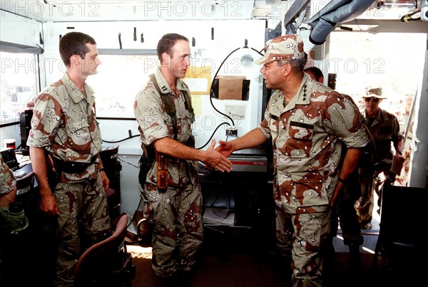 DESERT SHIELD - Colin Powell in fatigues in Saudi Arabia.