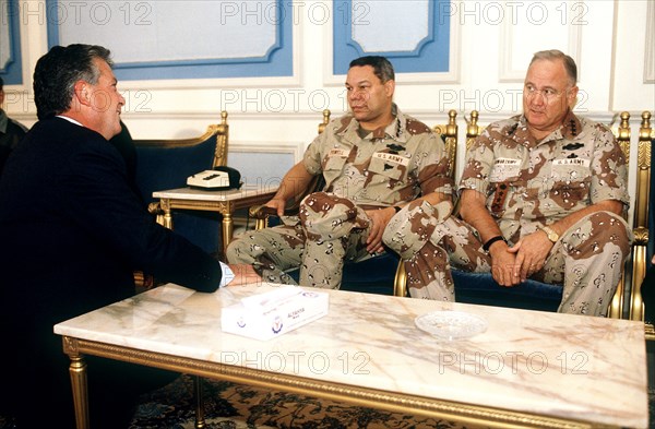 DESERT SHIELD - Colin Powell in desert fatigues in Saudi Arabia.