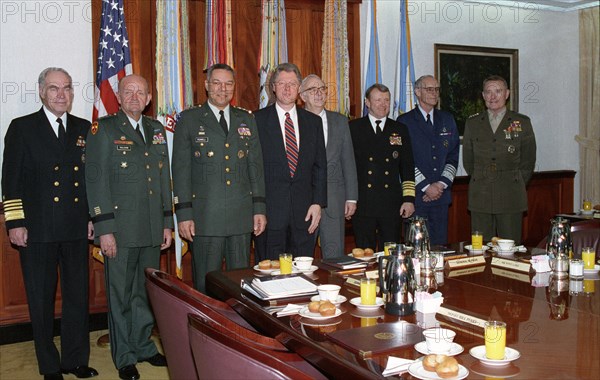 President Clinton poses with Colin Powell