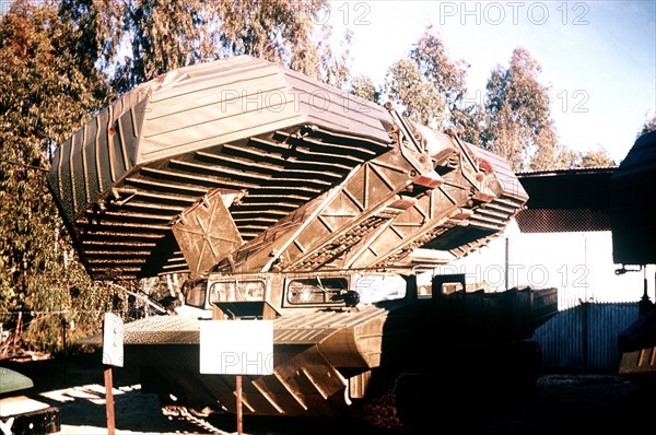 1974 - A left front view of a Soviet-built GSP heavy amphibious ferry with its pontoon partially deployed.