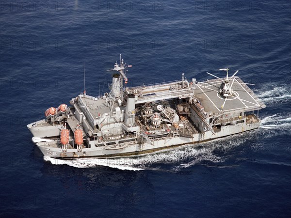 1979 - An aerial port bow view of the submarine rescue ship USS ORTOLAN