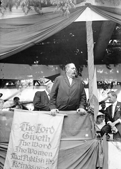 Man speaking at the woman suffrage march to the senate protest