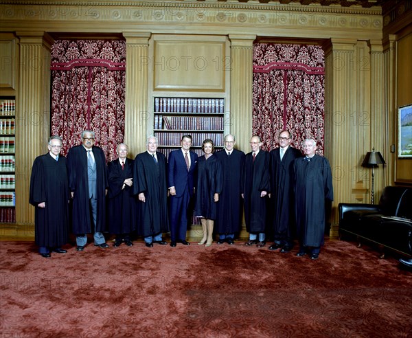 9/25/1981 Supreme Court Justices pose with President Reagan in the Supreme Court Conference Room.