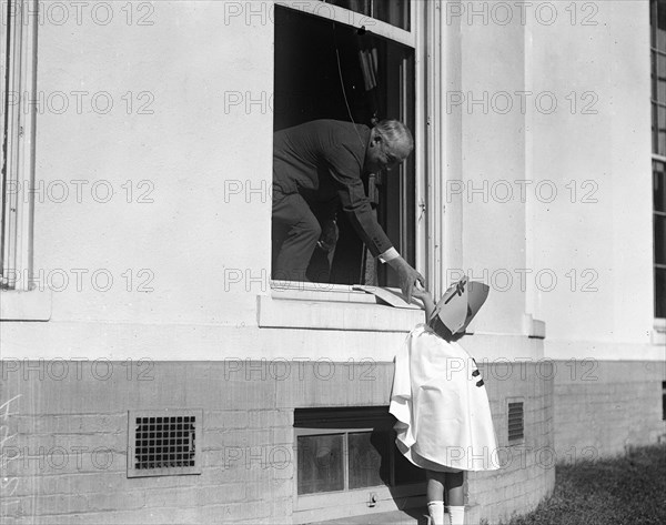 President Harding and Christmas seals child. White House