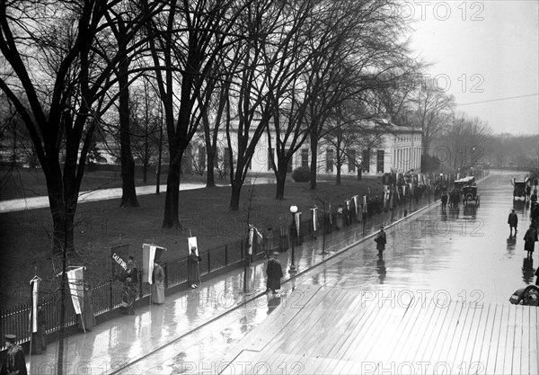 Woman suffragettes picketing at the White House