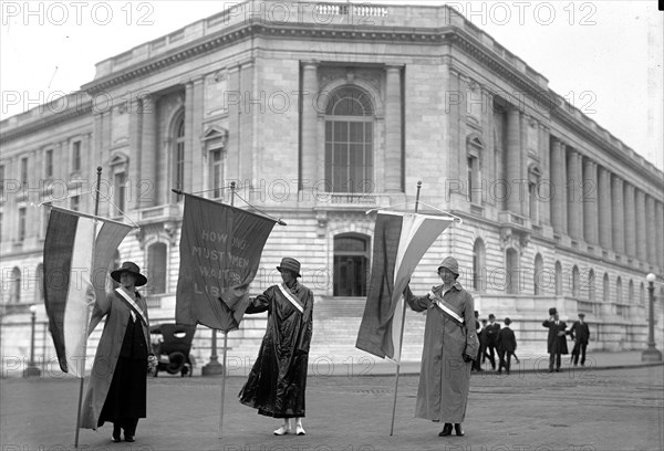 Woman suffragettes picketing at the senate office building