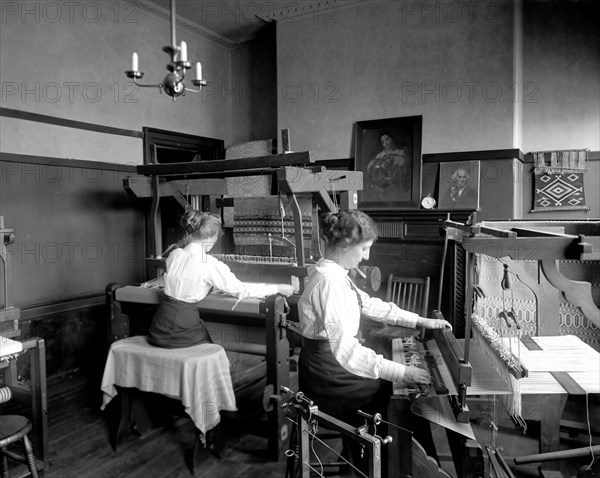 Women weaving on looms