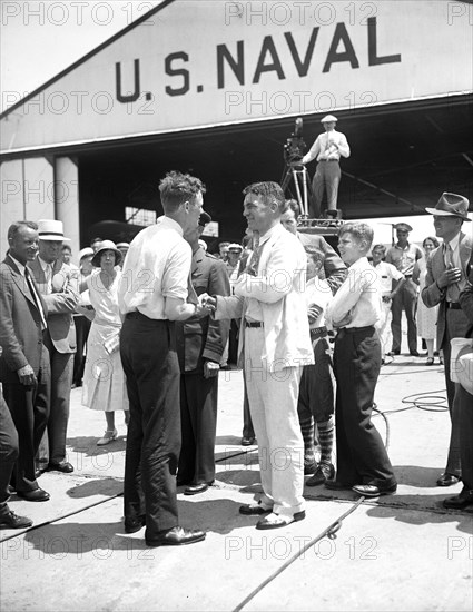 Charles Lindbergh and group at U.S. Naval hangar