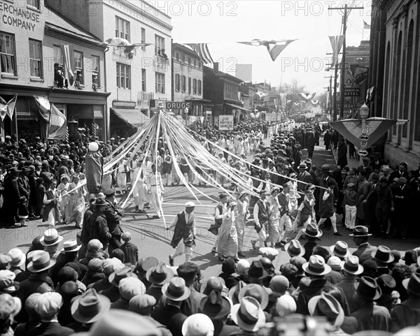 School children march in parade to welcome Apple Blossom Festival