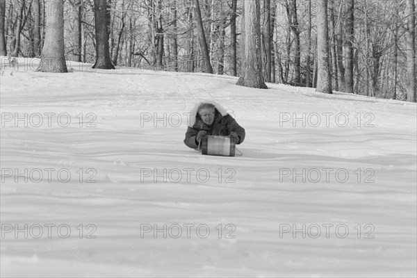 Jimmy Carter sledding at Camp David