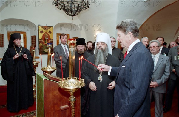 President Reagan lights candles.