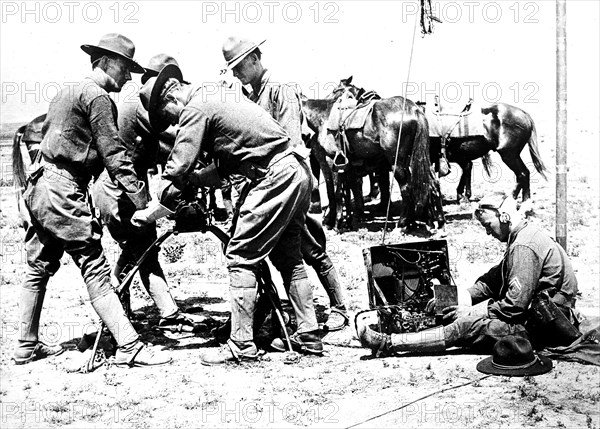 United States Army Signal Corps constructing lines in the Philippines