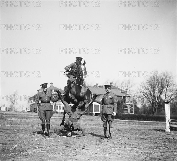 Horse jumping over person