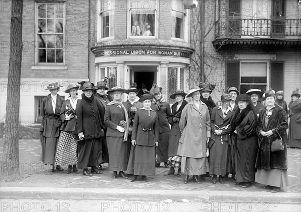 Standing in front of the Professional Union for Woman Suffrage