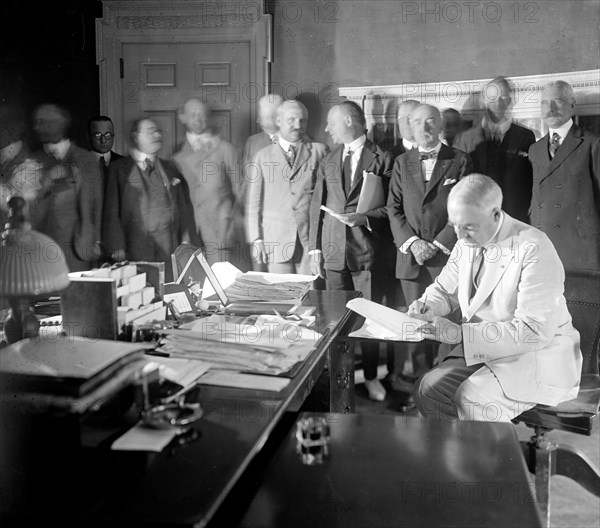 President Warren G. Harding signing the Edge