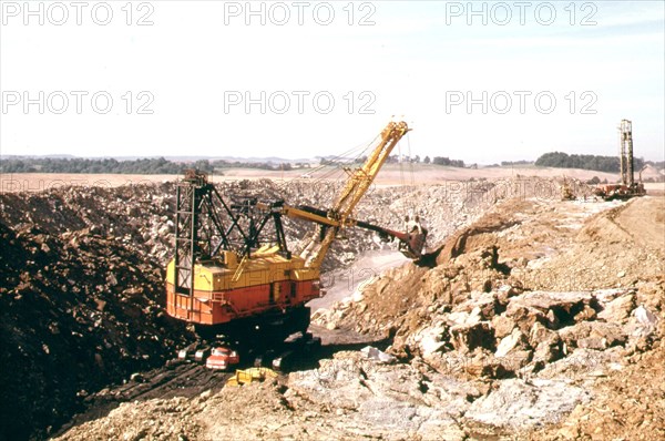 One of the Coal Company Power Shovels Digs