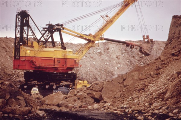 A Huge Shovel Digs Towards A Seam of Coal Off Route 800