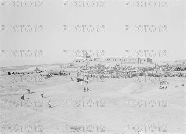People walking at Neby Mousa [i.e., Nebi Musa] ca. 1900