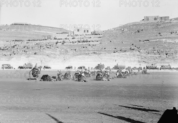 Prince Emir Saud's visit to Emir Abdullah in Amman, Transjordan. Camel Corps of Arab Legion, camel drill ca. 1935