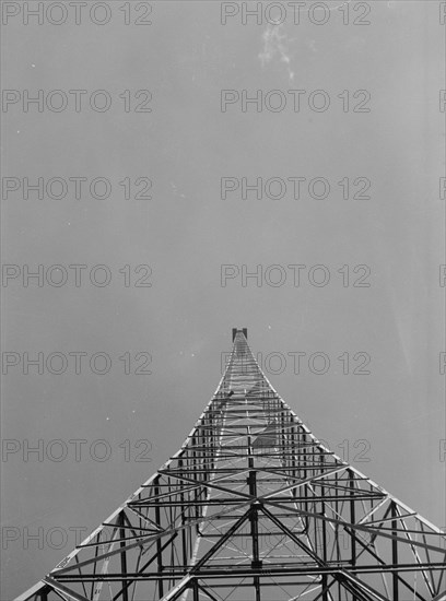 Looking up at radio tower at the International Broadcasting Station in Ramallah ca. between 1934 and 1939