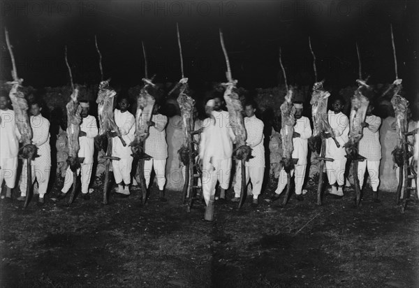 The Samaritan Passover on Mt. Gerizim, Samaritan men with prepared carcasses ready for the oven. ca. 1900