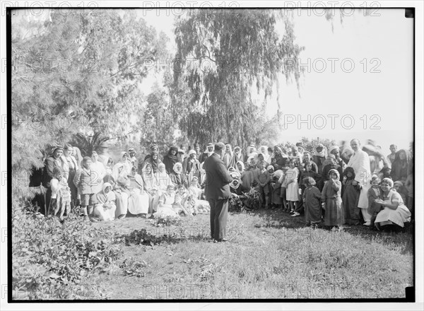 Scots Mission Hospital, Tiberias. Morning church service to a gathering of out-patients (Rev. Abdullah) ca. between 1934 and 1939