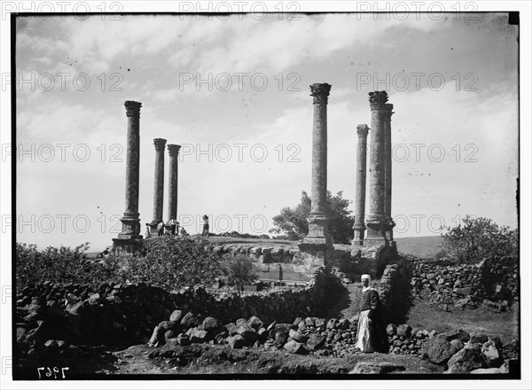 1930s Kanawat: Man standing in front of ruins of early church in the form of a Roman basilica ca. 1938