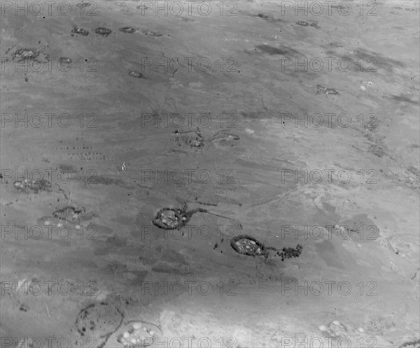 Native homes in Kismu Kenya surrounded by circles of reed walls called Bomas ca. 1936